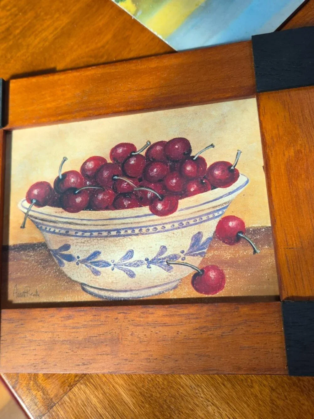 LIFE IS A BOWL OF CHERRIES BY ABBOT READE IS IN AWOOD FRAME 10X8